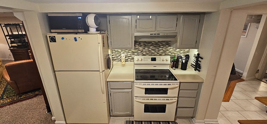 Galley Kitchen: Air Fryer/MW, Refrigerator/Freezer, Double Oven, Glass-top Range