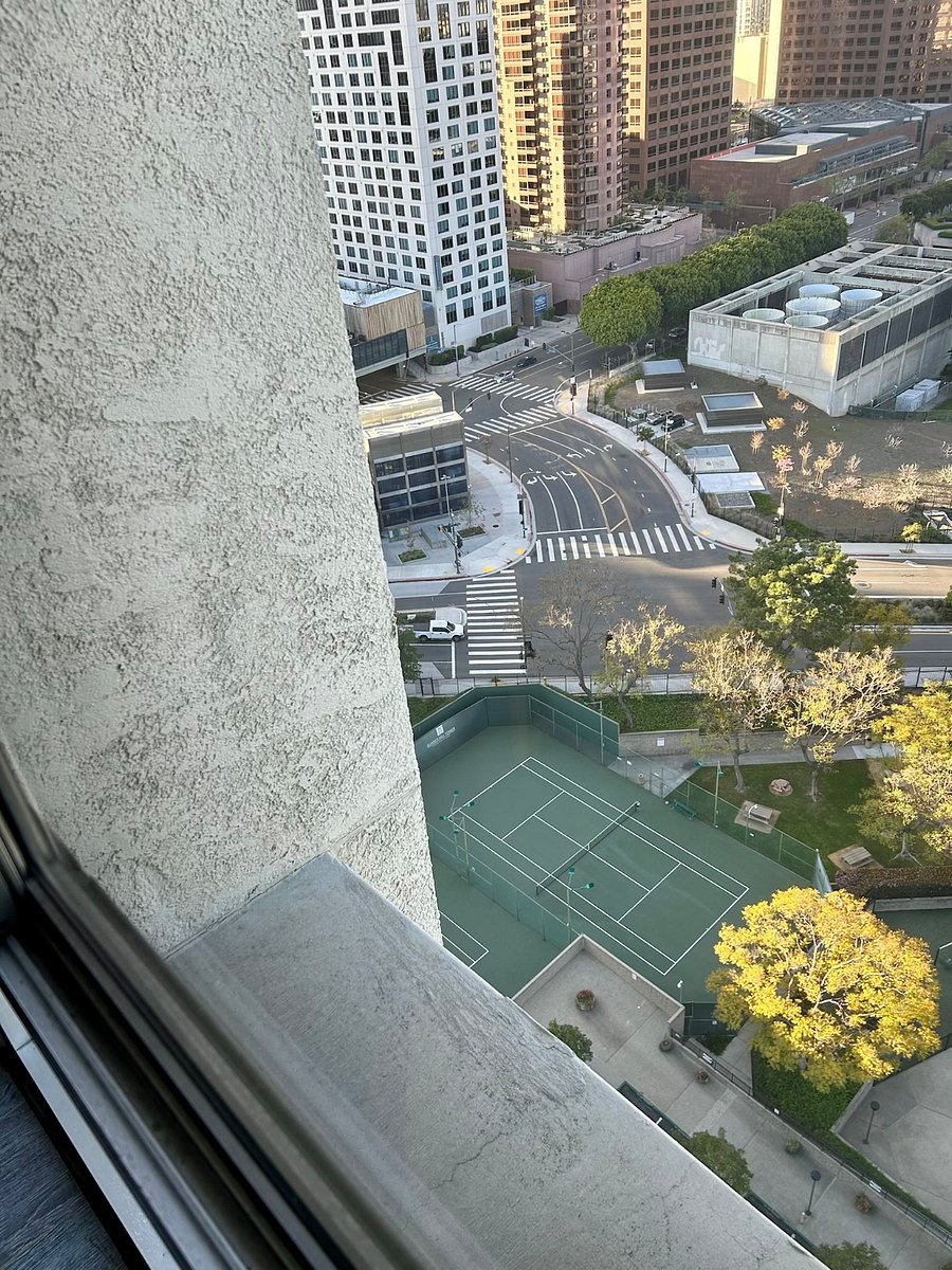 Tennis court (on property) and metro station (across street)