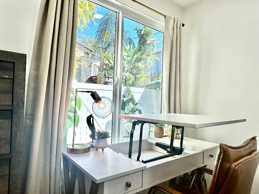 The desk can be used in a stand-up style as well, which also creates additional in-desk storage (along with the 2 desk drawers)