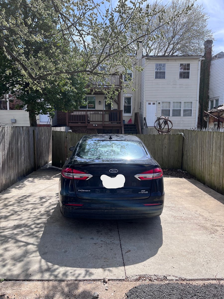 Parking in the alley attached to back yard.