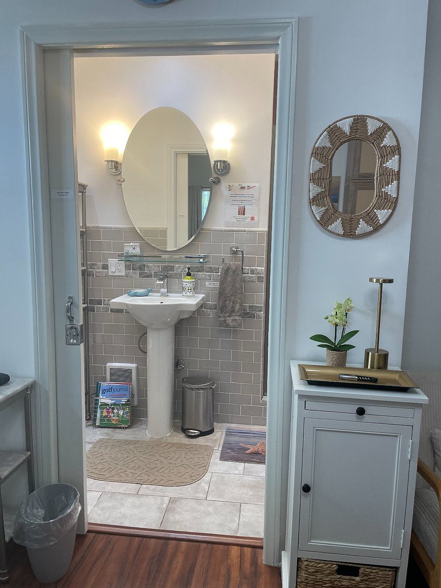 From room stepping into private bathroom