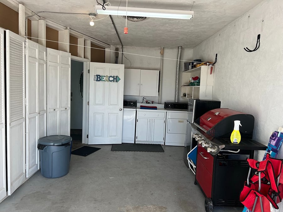Garage with W/D, grill and beach toys
