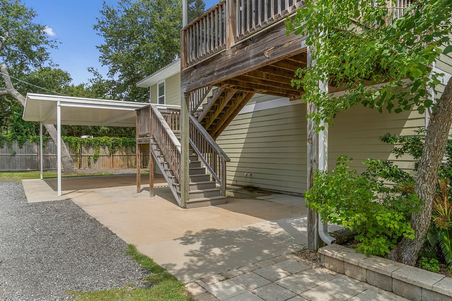 Stairs to apartment, small covered area for parking available to tenant as well (under stairs/balcony).
