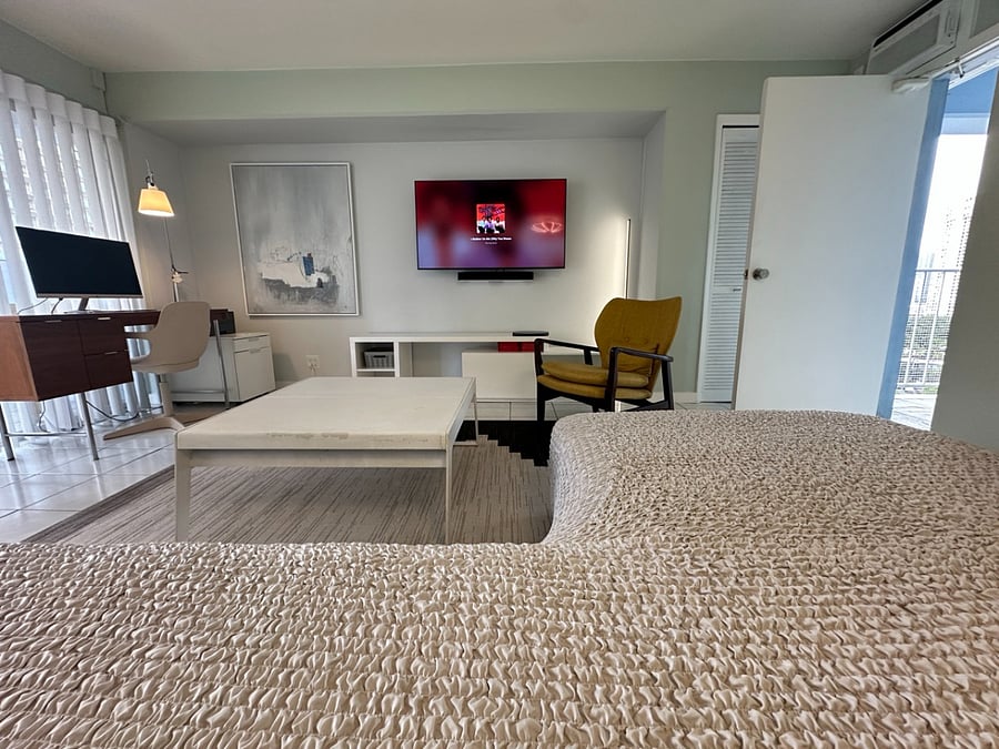 Large Sofa in Living Room with Amenities like Desk , Computer Screen $ Brother Printer