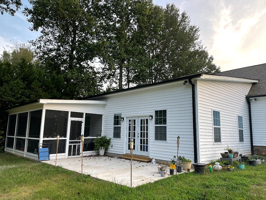 The screened porch offers a cozy, bug-free space to relax, with ceiling fans to keep you cool on warm days. Its the perfect spot to enjoy the outdoors, whether youre unwinding with a book or listening to the rain.