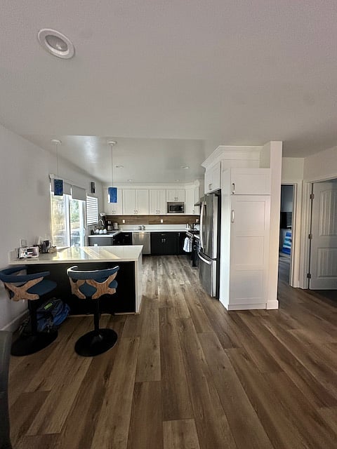 Peninsula and kitchen, slider to deck