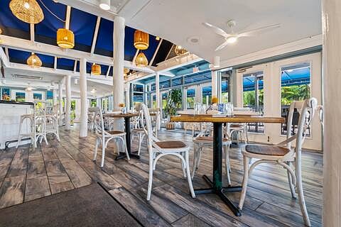 On site restaurant Hogfish Harrys. Indoor Seating available with bar and TVs. 
