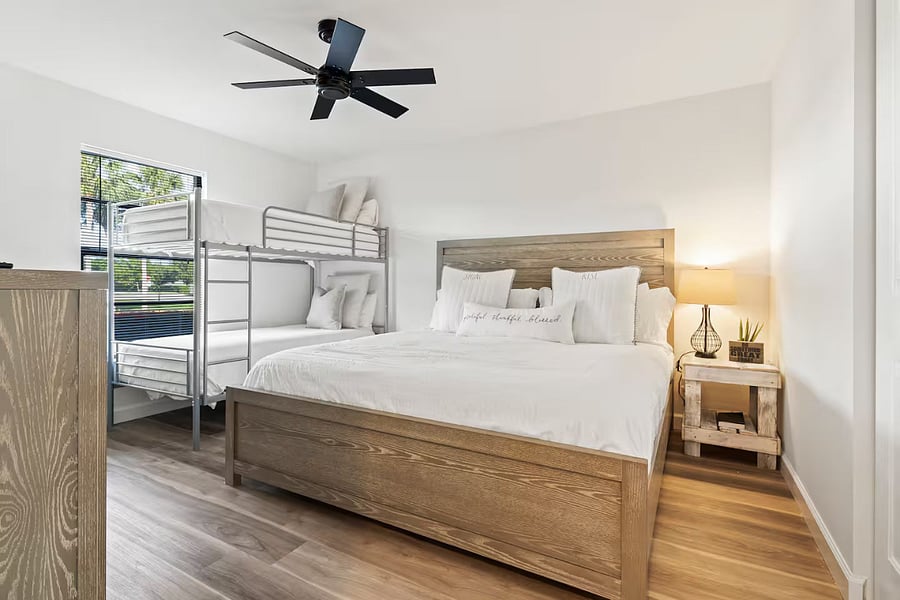 Master Bedroom 1 includes a King size bed and twin bunk beds. And a 55 in TV