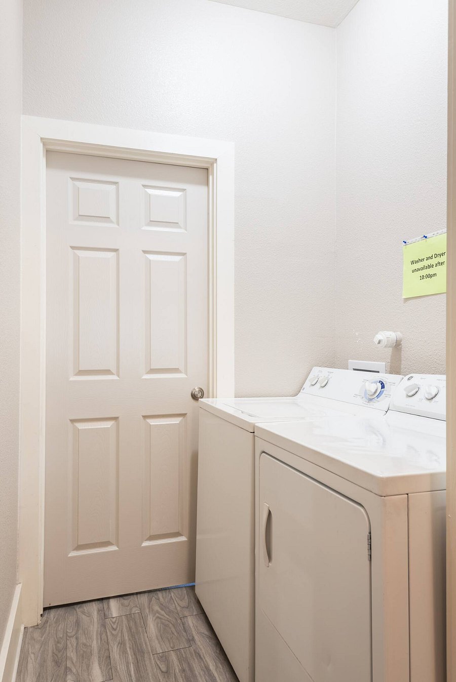 Locked washer/dryer shared area.