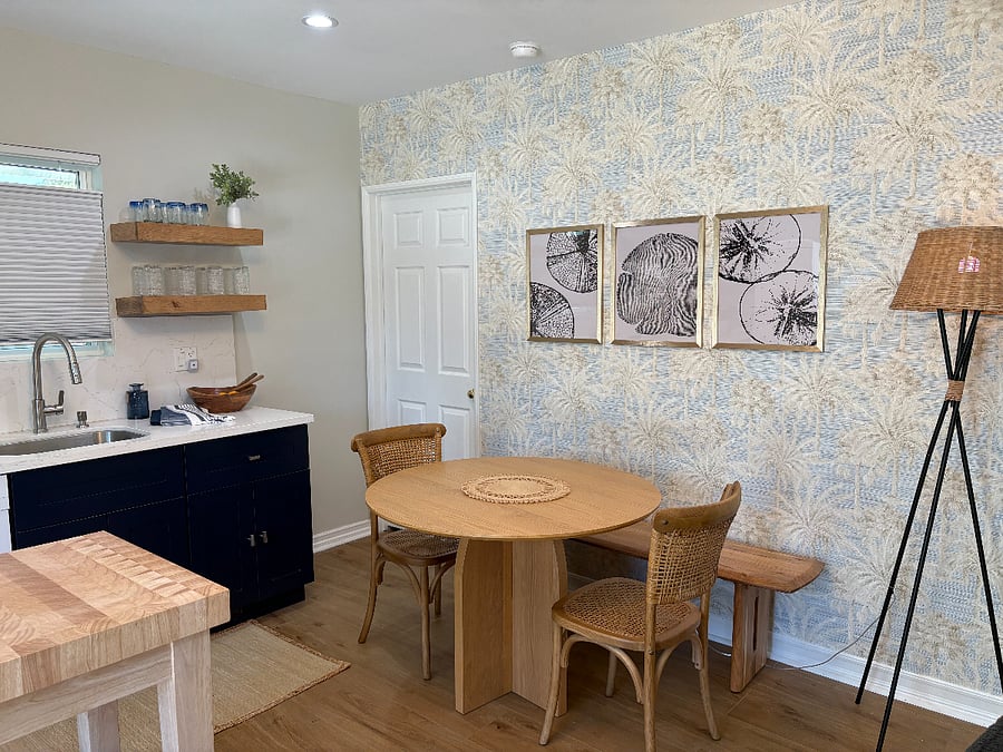 dining area with bench seating and 2 chairs- seats four comfortably