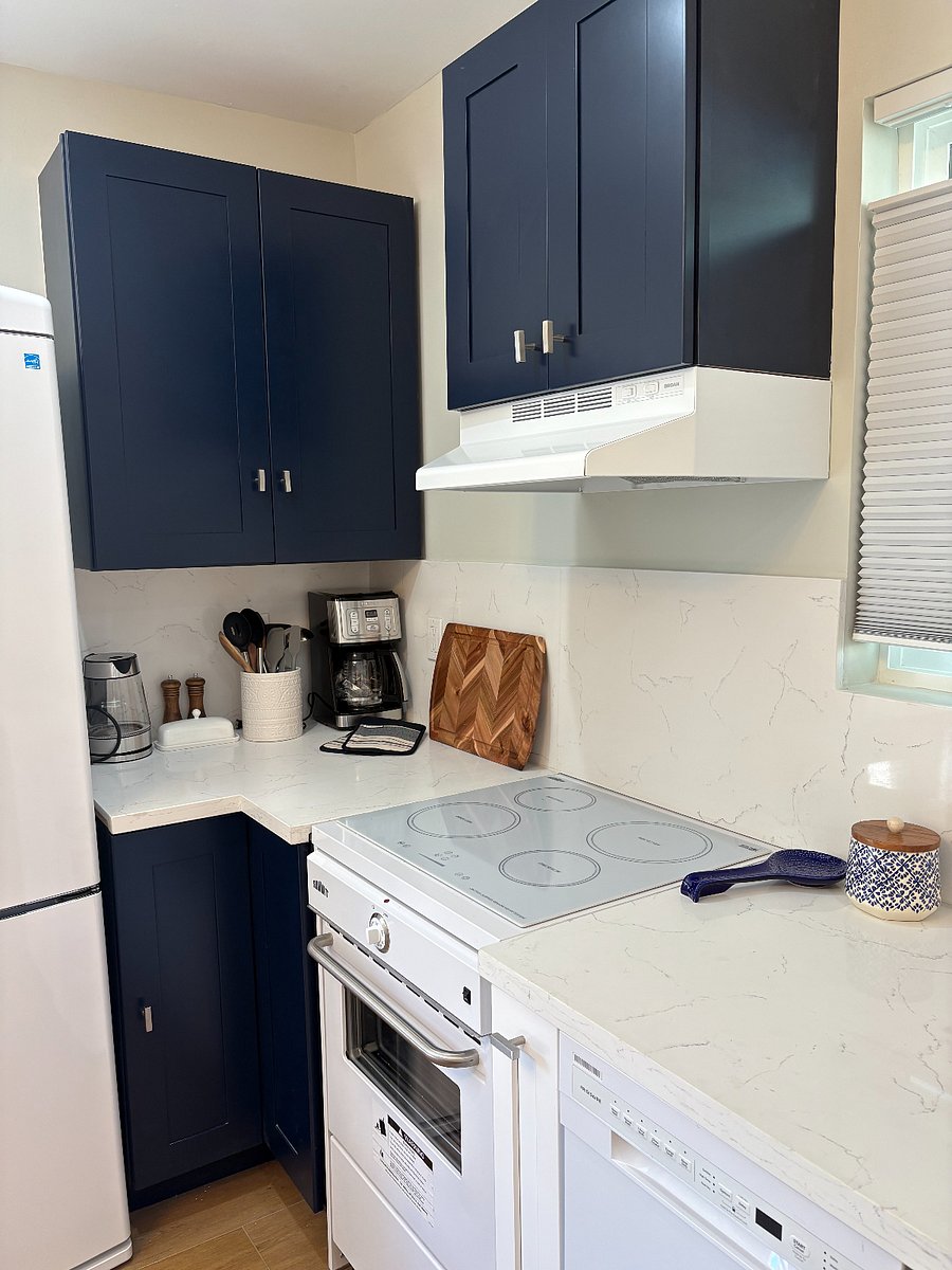 new induction stove/oven and full set of pots, pans, mixing bowls, measuring spoons and cups, plus toaster, coffee machine, mixer, microwave, and full baking supplies. everything you need...and then some.