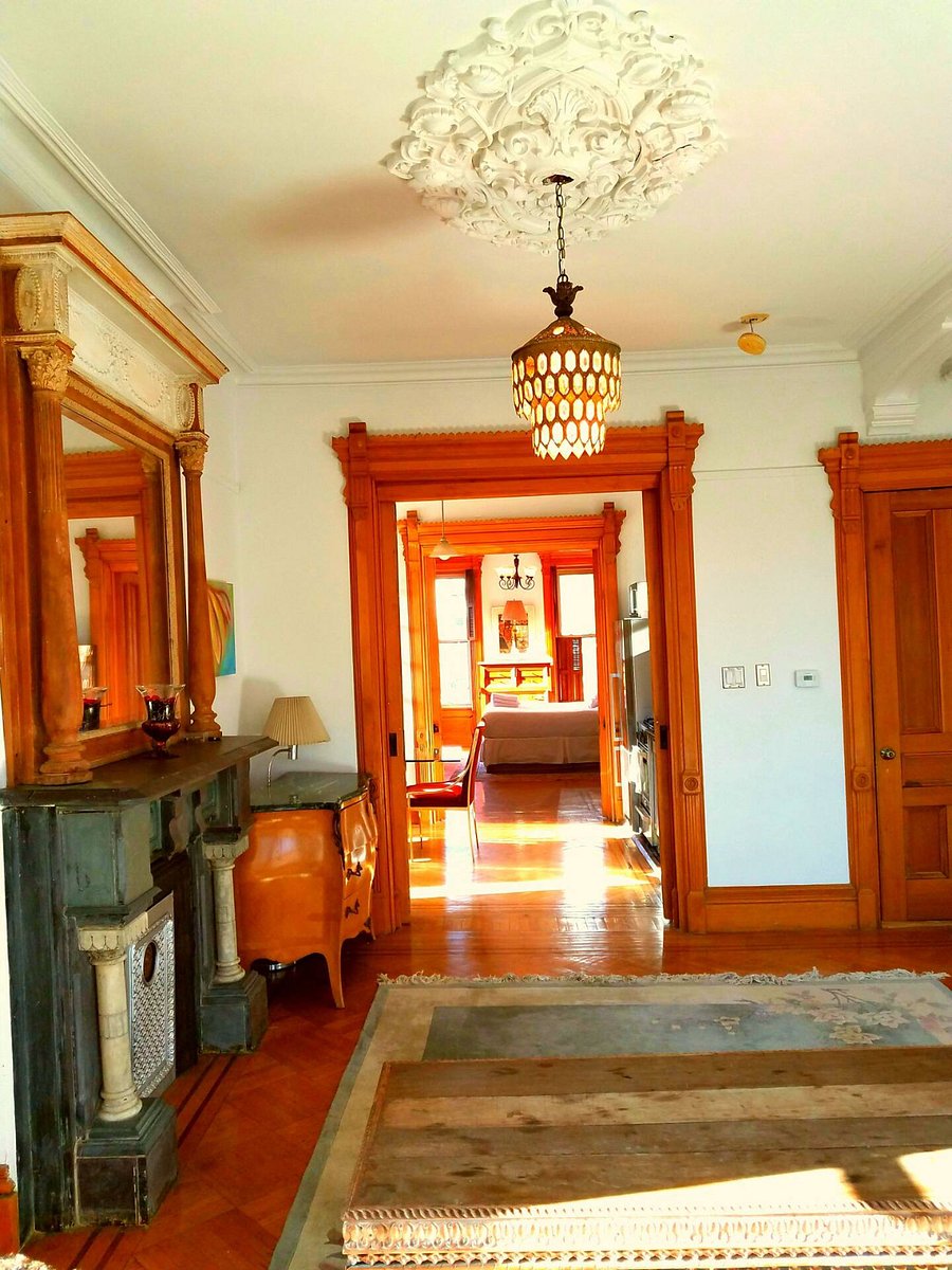Looking from the living room into the 1st bedroom via the kitchen,