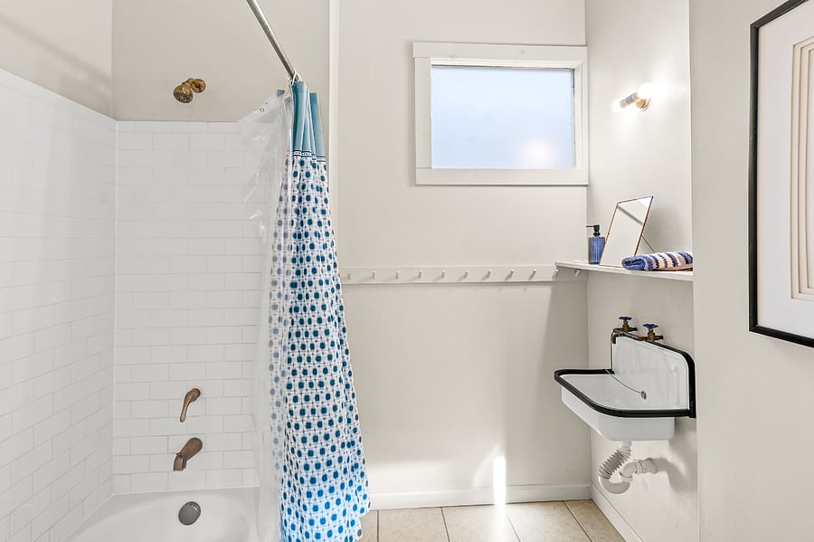 Full shower with two sinks