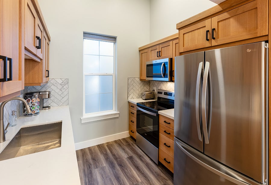 Full-sized, fully stocked kitchen