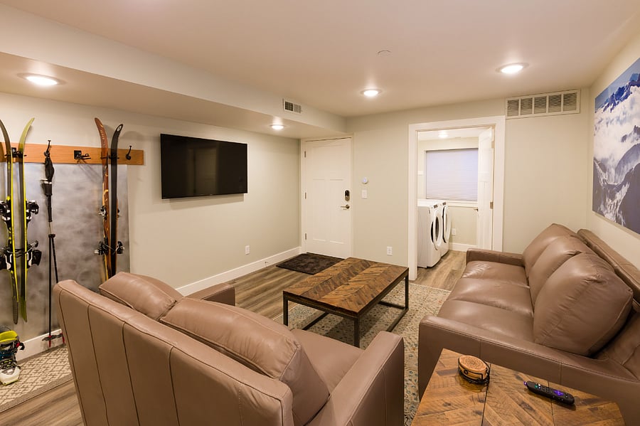 Living room with adjacent laundry room