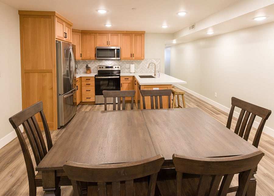 Dining area looking to kitchen