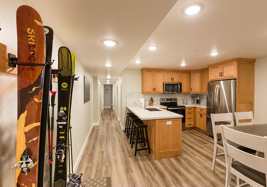 Kitchen, looking down hallway toward bathroom and bedrooms