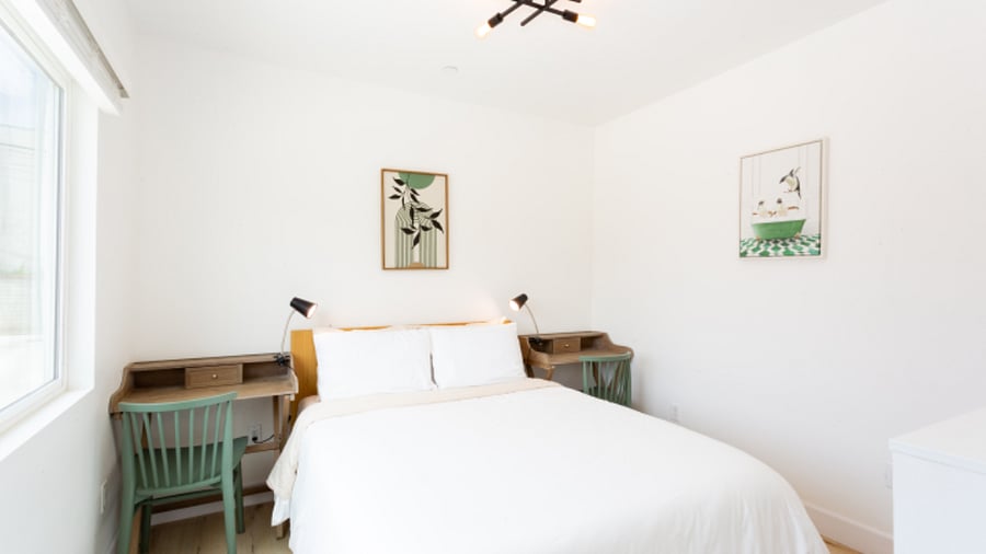 Guest bedroom with a Queen bed and 2 Desks (one for study and one for vanity if you desire). 12 inch memory form mattress and the nice bedding give you a good night sleep. 