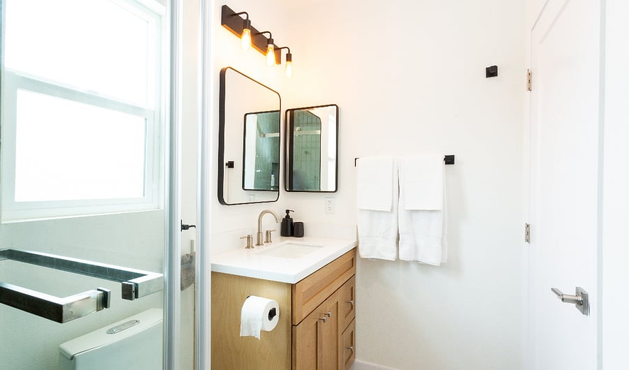 Guest bathroom with beautiful tile and fixture. 