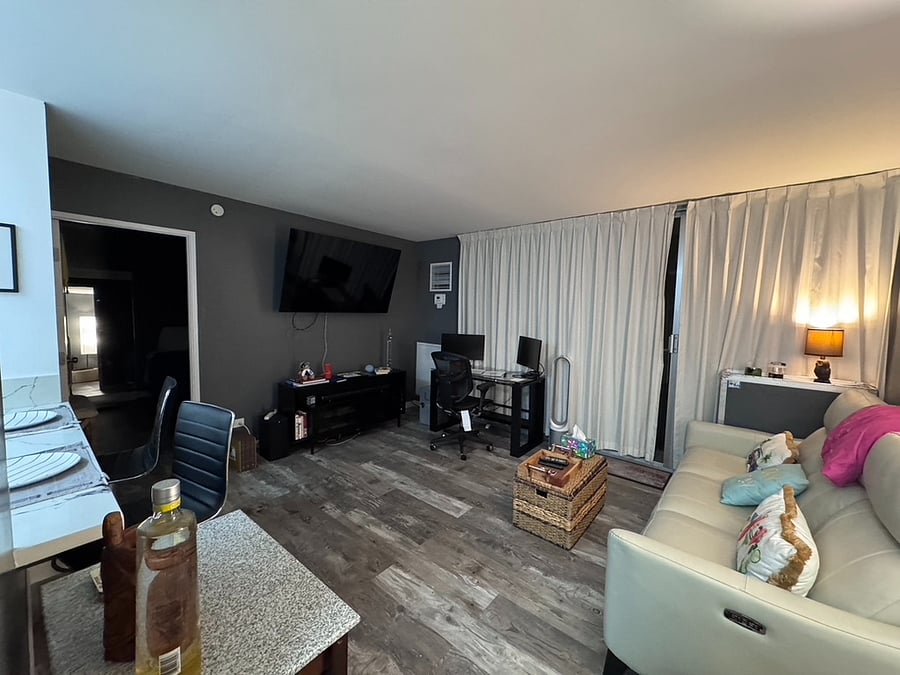 Living room with desk and monitor, soft with dual recliners