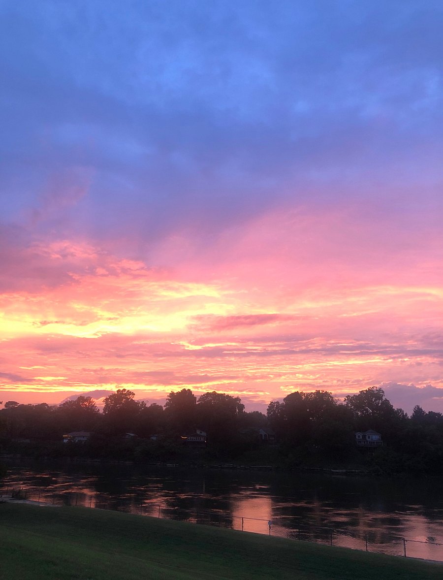 View of sunset over the Cumberland River from the park near the home