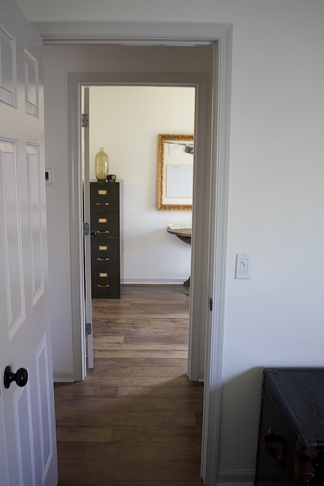 View across the hall from the guest bed into the office/workout space
