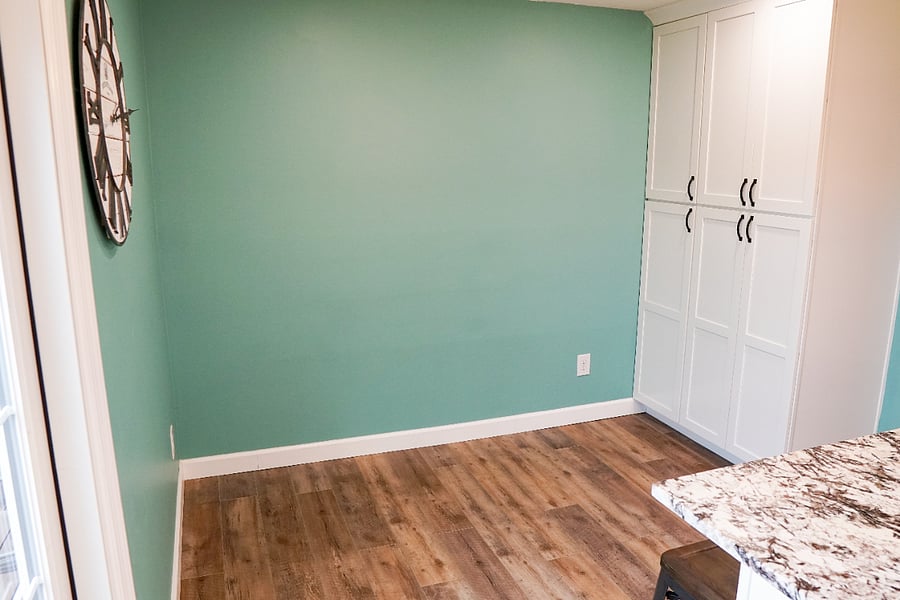 newly renovated kitchen with all new flooring, cabinets, countertops, lighting, and appliances