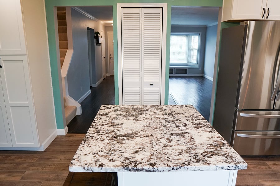 newly renovated kitchen with all new flooring, cabinets, countertops, lighting, and appliances