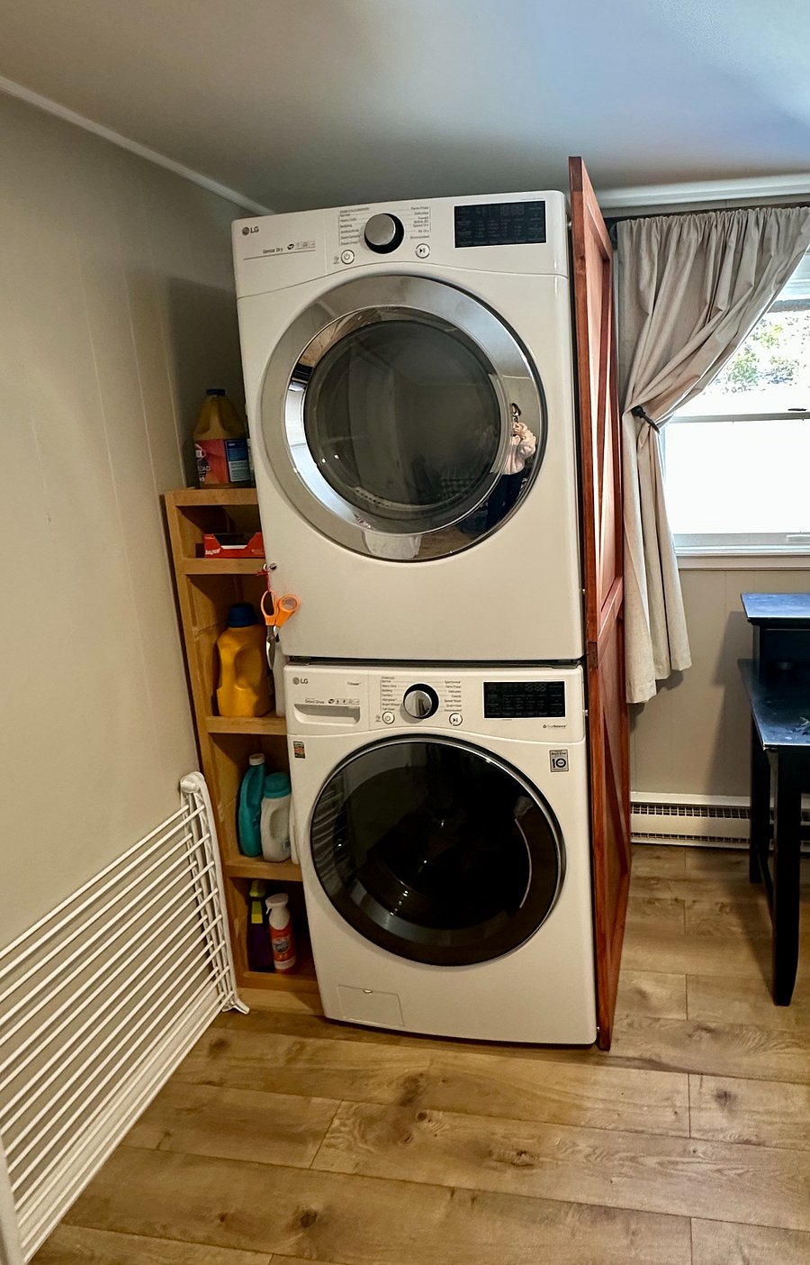 Laundry room is shared with the other unit. Full size washing machine and gas dryer that drys clothes fast!