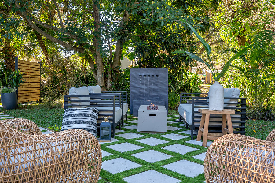 Step into your own private oasis! Backyard features lush, mature landscaping, a peaceful water fountain, and cozy seating, perfect for unwinding after a long day. Whether youre sipping your morning coffee or enjoying an evening break