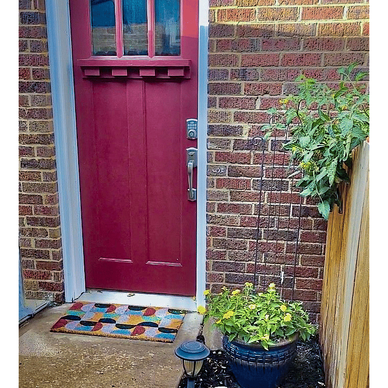 Private door with digital lock; staircase to the apartment