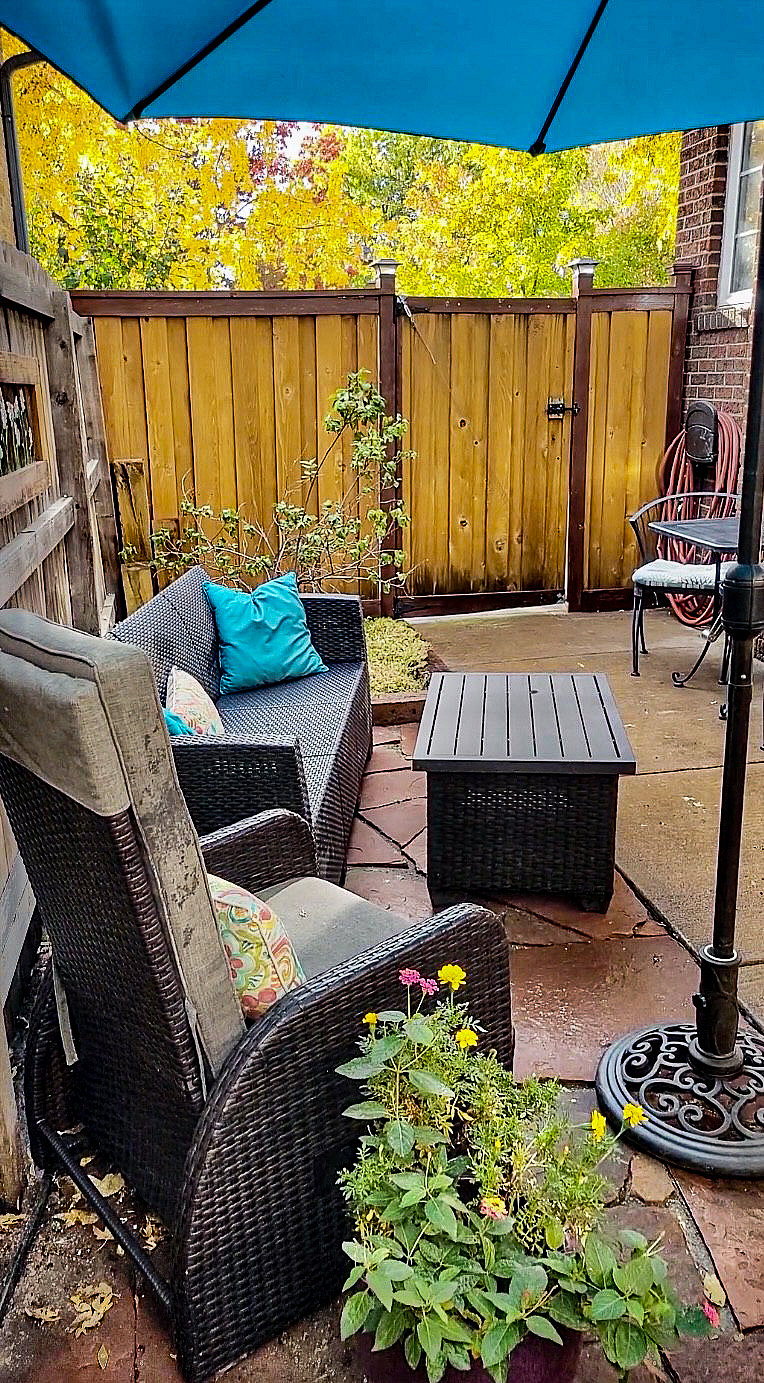 Your private patio, furniture to relax in the Colorado sunshine, and a little garden area