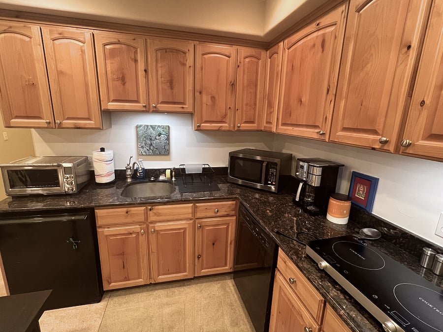 Breville Smart Oven, microwave, induction cook top, dishwasher, fully stocked dishes, cookware and pantry supplies