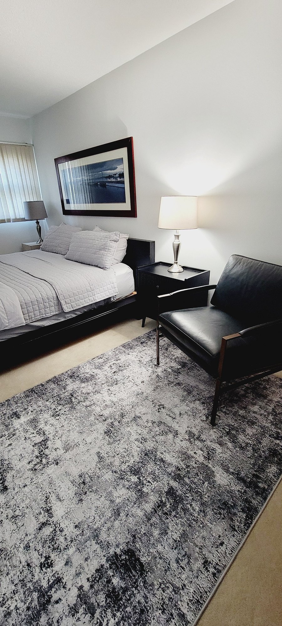 Master bedroom - Bedroom #1: King size bed, sitting area, dresser, closet, lamps, side tables. Ensuite full bathroom (vanity, toilet, shower, stack washer and dryer)