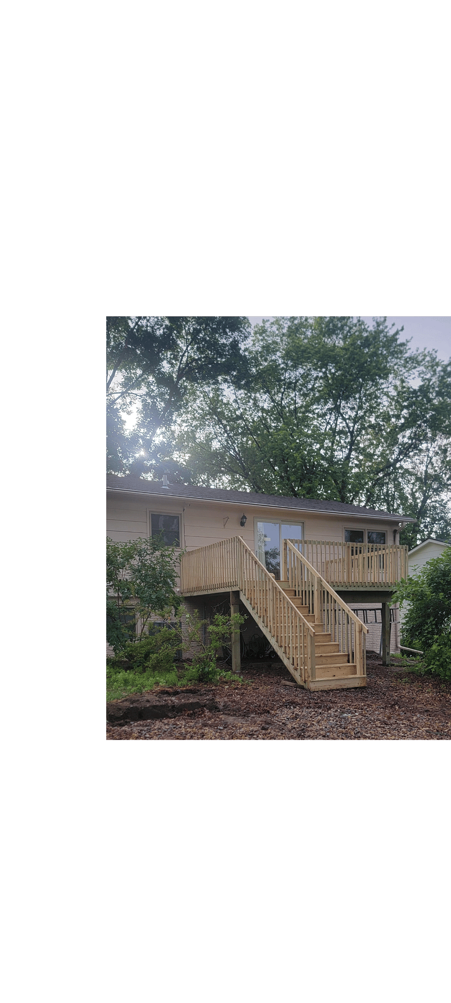 New deck constructed on the back of the house. Patio chairs provided! Enjoy the serenity and view of the trees and plants!