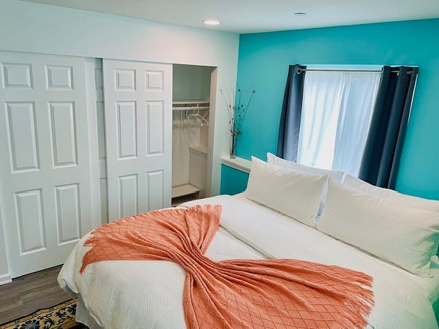 8-foot closet space with shoe stand and hangers. Extra blanket and space heater provided in closet.