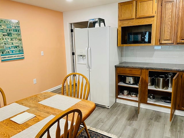 Pots, pans, dishes, glasses, crockpot, and other kitchen amenities included.