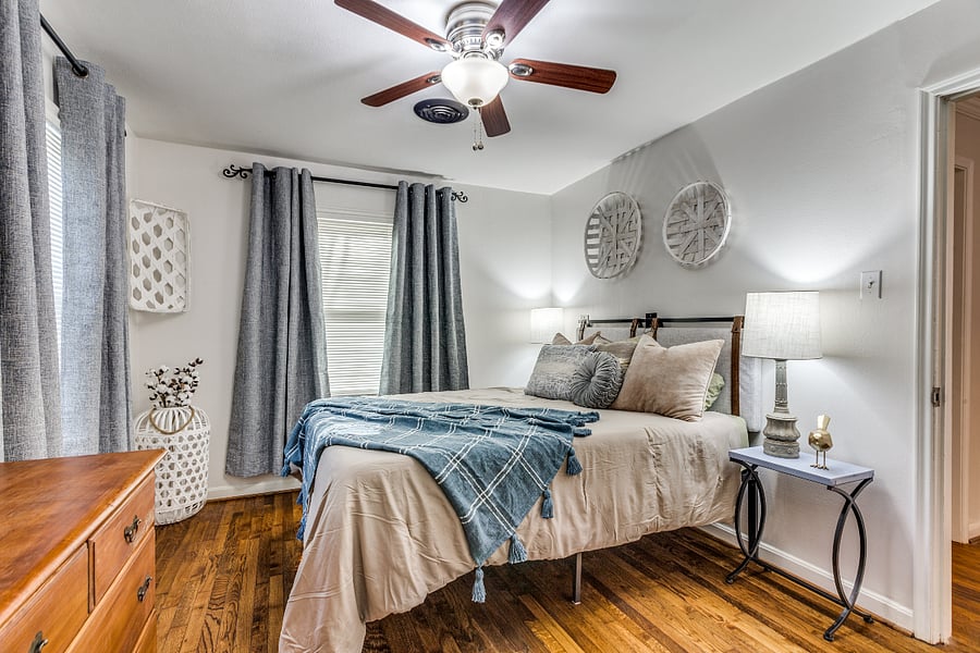 large closet, queen bed, large television, blackout curtains, adequate space for hanging and folded clothes