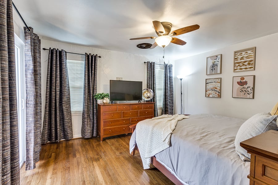 king bed, large television, blackout curtains