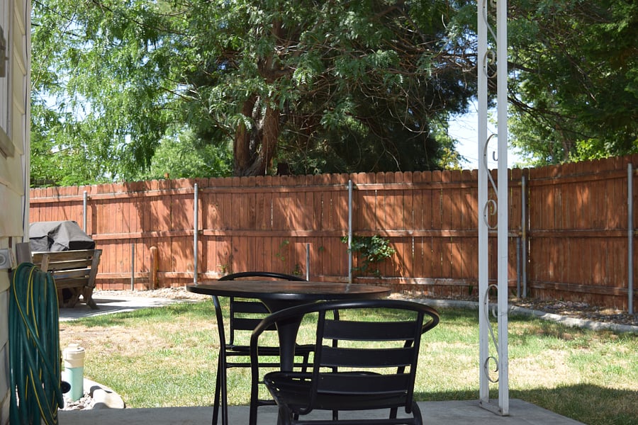 Back porch with seating; BBQ