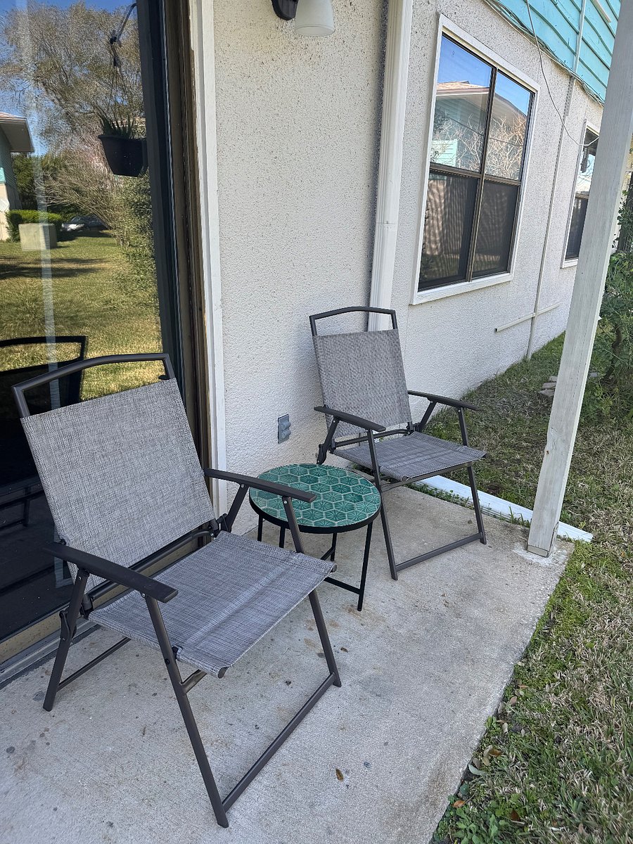 Outdoor sitting area off of living room