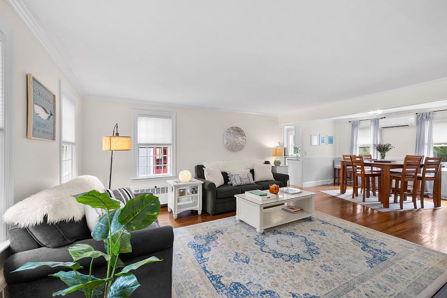 Living room with adjoining dining area.