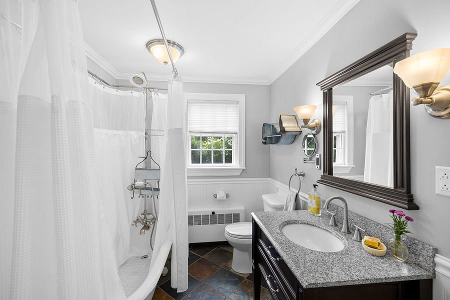 Downstairs bathroom with beautiful clawfoot tub and shower.