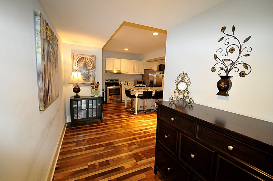 entrance foyer that includes more dressers and storage space