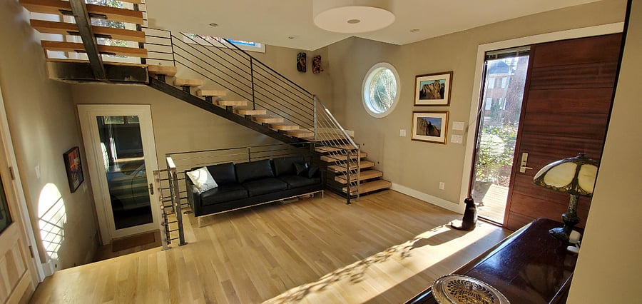 Shared stairway from garage with parking for your car to the third floor suite.