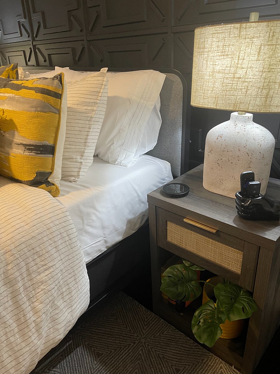 Nightstands come with usb plug-ins behind the lamps