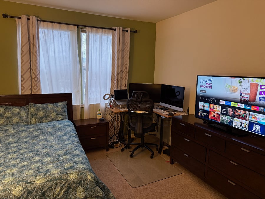 L-shaped desk, 55 inch Smart TV