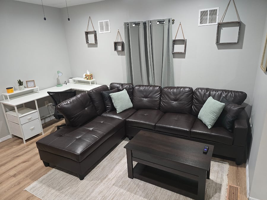 Living room sectional with lift top coffee table and desk area in left corner