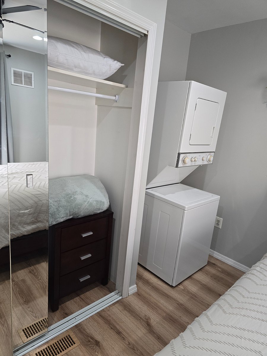 Brand new washer/dryer conveniently placed in bedroom
