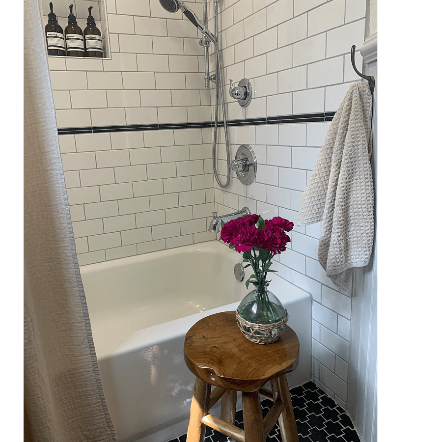 Shower tub combo also has a handheld shower sprayer
